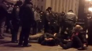 Ukrainian police filmed beating anti-government protesters