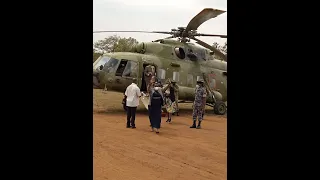 Museveni's Premier Nabanjja Taking her First Helicopter Experience