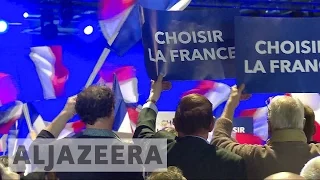 French election: Candidates rally amid May Day protests