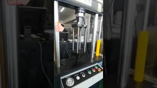 Spring fatigue testing machine