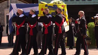 Royal marines carry Prince Phillip's coffin into St George's chapel