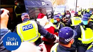 Santa gets arrested at Covid-19 anti-lockdown protest in London