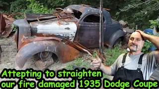 Attempting to straighten out the fire damaged 1935 Dodge Coupe we now call The Phoenix.