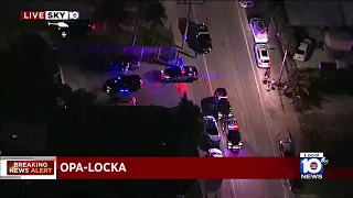 Police officers investigate shooting in Opa-locka