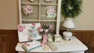 A shabby chic Victorian vignette with IOD products and decoupaged napkins using thrifted items.