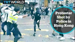 Protester shot at point-blank range by police in Hong Kong