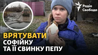 Evacuation in recently liberated Ukrainian village as constant shelling doesn't stop [ENG SUB]