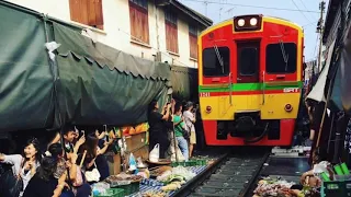 Тайский экспресс - самый опасный рынок мира на рельсах!