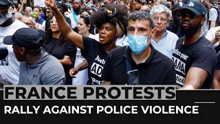 Thousands defy bans in France to rally against police violence