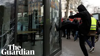 Protesters smash shopfronts in central Paris over pensions reforms