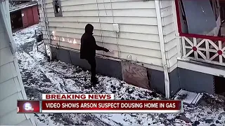 Exclusive video shows suspect setting fire to abandoned house in Cleveland