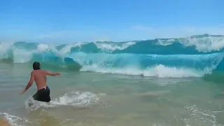 P O V  Reversed Massive Wave At Big Beach in Maui wipes swimmers out in reverse motion !