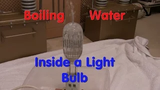 Boiling water inside a light bulb