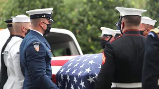 John Lewis' casket arrives at South-View Cemetery in Atlanta