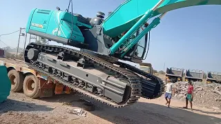 kobelco 380 traller unloading