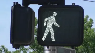 Vandals alter Albuquerque pedestrian crosswalk signals to give the middle finger