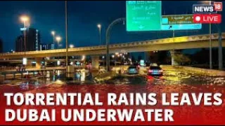 Rain in Dubai flooding hobbles major airport's operations as "historic weather event"