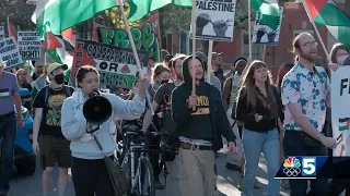 Pro-Palestinian protestors march from Burlington City Hall to UVM's encampment