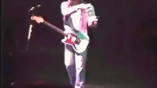 Kurt Cobain receiving a fanart on stage (Italy 1994)