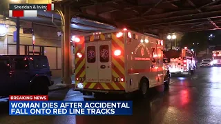 Woman dies after falling onto Chicago train tracks, police say