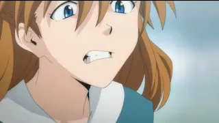 Asuka blinks and slaps Shinji