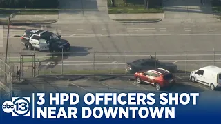 3 HPD officers shot near downtown, police say