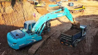 Incredible Loading Driving Overloaded Dump Truck by Kobelco SK200 Excavator