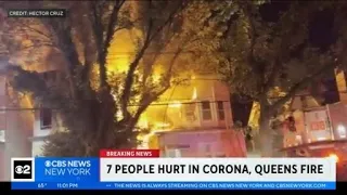 7 injured as flames spread between 2 Queens homes