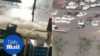 Hundreds of vehicles submerged in northern China floods