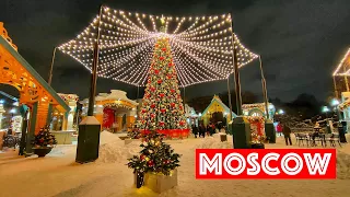 Moscow walk. Snowy winter and Christmas market on Red Square.