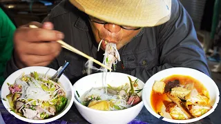 Morning food market scenes, eating delicious noodle soup, Cambodian food market