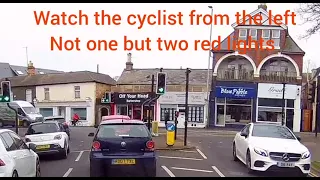 Cyclist does two Red Lights.