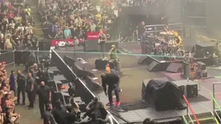 Fan rushes RAGE AGAINST THE MACHINE on stage, security takes out Tom Morello instead