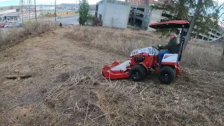 Ventrac 4520 cutting overgrown bank.