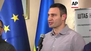 Opposition headquarters raided; leaders Klitschko and Yatsenyuk comment