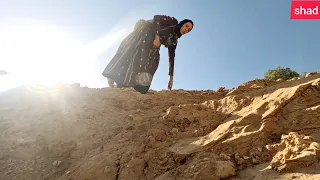 A Nomadic woman who goes to the mountains and leaves the children alone at home to gather firewood