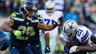 Zeke drops Earl Thomas with strong stiff arm