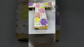 T-shaped cake with macarons, fruit, and chocolate #viral #foryou #fyp #dessert