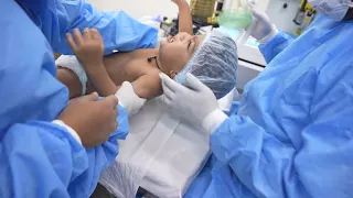 Agressive Scared Baby Runs away from Surgery