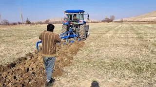 Ploughing with 100 HP Tractor. New Holland TD100D