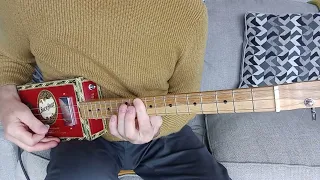 Cramps, Human Fly lesson on 3 string cigar box guitar..