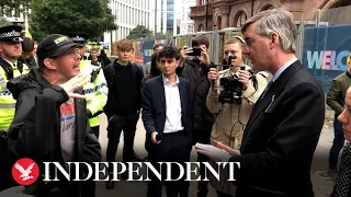 Rees-Mogg confronted by disability campaigner at Tory conference