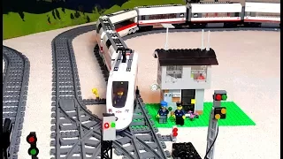 Long train arriving and leaving Lego City railway station