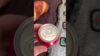 Girl Shows Empty Coke Zero Can