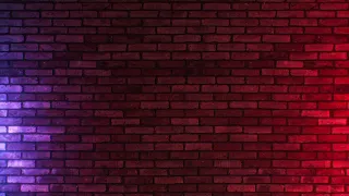 4K Screensaver Police Lights on a Brick Wall - Dynamic Footage for Your Next Project!