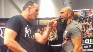 Rik Brown toys with 60lb Homemade Club at Arm Wrestling booth