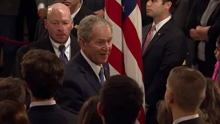 George W. Bush and family visit father's casket at Capitol Rotunda