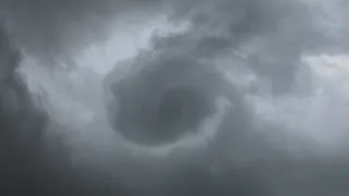 Looking straight up at a funnel cloud!