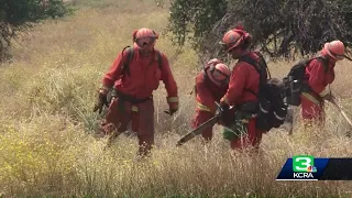 Crews work to stop wildfire burning in Nevada County