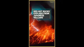 Red hot rocks explode from Japanese volcano